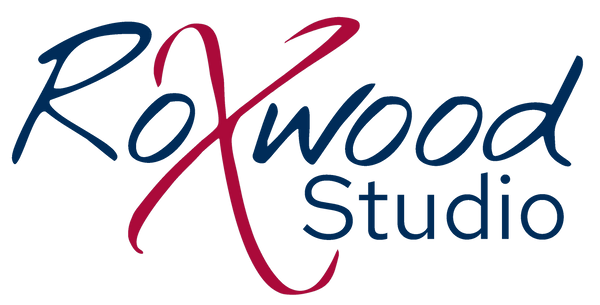 Logo for Roxwood Studio in blue with a large red X